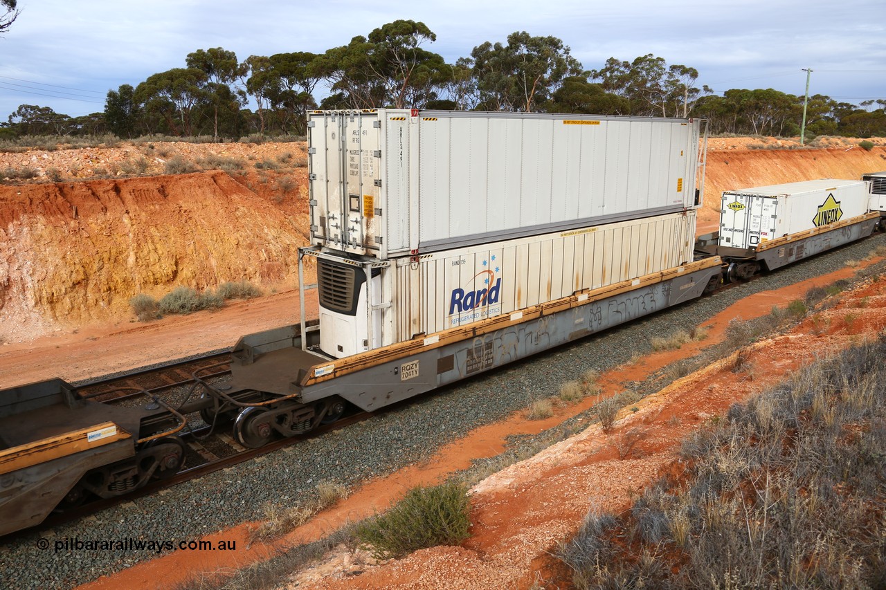 160524 3820
West Kalgoorlie, 2PM6 intermodal train, RQZY 7041 platform 4 of 5-pack well waggon set, one of thirty two sets built by Goninan NSW in 1995-96 for National Rail loaded with a RAND Refrigerated Logistics 46' MPR1 Type reefer RAND 135 double stacked with an ARLS 46' RFRG type reefer ARLS 491.
Keywords: RQZY-type;RQZY7041;Goninan-NSW;