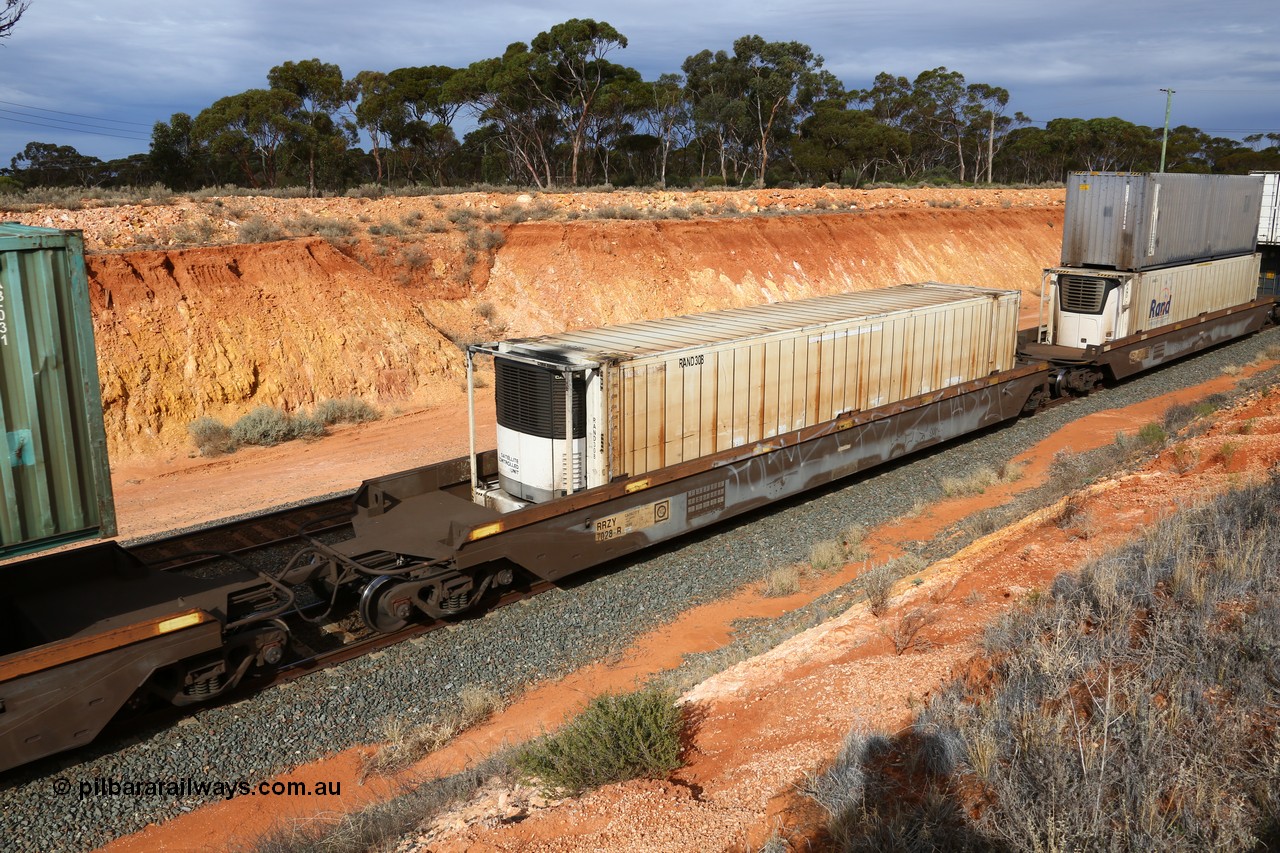 160524 3825
West Kalgoorlie, 2PM6 intermodal train, RRZY type five unit bar coupled well container waggon set RRZY 7028 platform 2, originally built by Goninan in a batch of twenty six as RQZY type for National Rail, recoded when repaired. Loaded with a plain RAND 46' reefer RAND 308.
Keywords: RRZY-type;RRZY7028;Goninan-NSW;RQZY7-type;