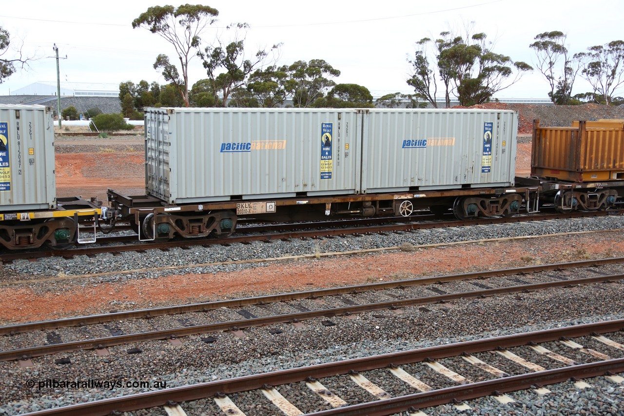 160524 4294
West Kalgoorlie, 1MP2 steel train, RKLY 20310, totally unrecognisable from original build by EPT NSW 1979-81 as part of a batch of two hundred BDY type 14.20 metre open waggons, had several recoding's prior to its current guise, loaded with two Royal Wolf 22G1 type 20' boxes RWLU 814966 and RWLU 814909.
Keywords: RKLY-type;RKLY20310;BDY-type;NODY-type;NKDY-type;RKDY-type;RKCY-type;