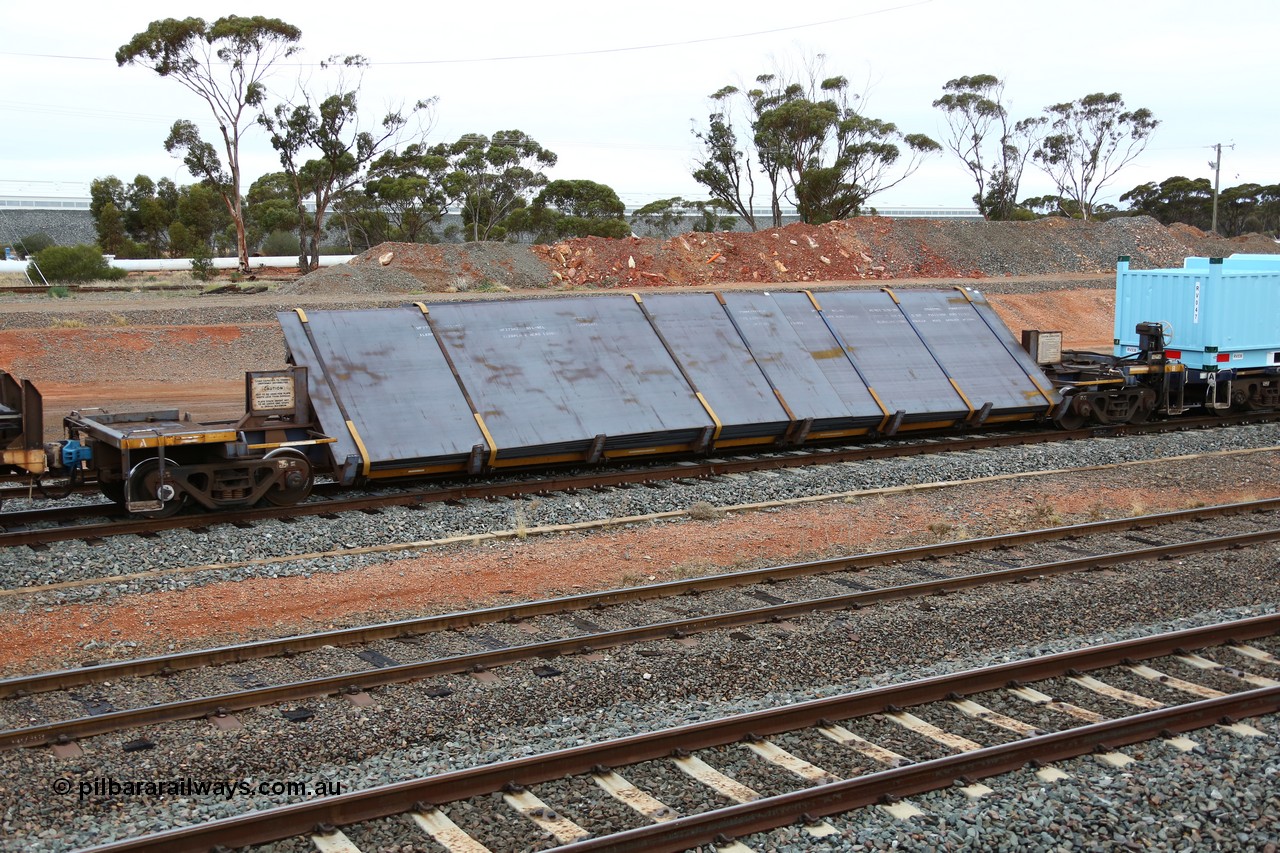 160524 4299
West Kalgoorlie, 1MP2 steel train, RKYY type wide steel plate tilt waggon RKYY 7091, one of twenty seven units built by AN Rail Islington Workshops in 1995-96. Loaded with steel plate.
Keywords: RKYY-type;RKYY7091;AN-Islington-WS;