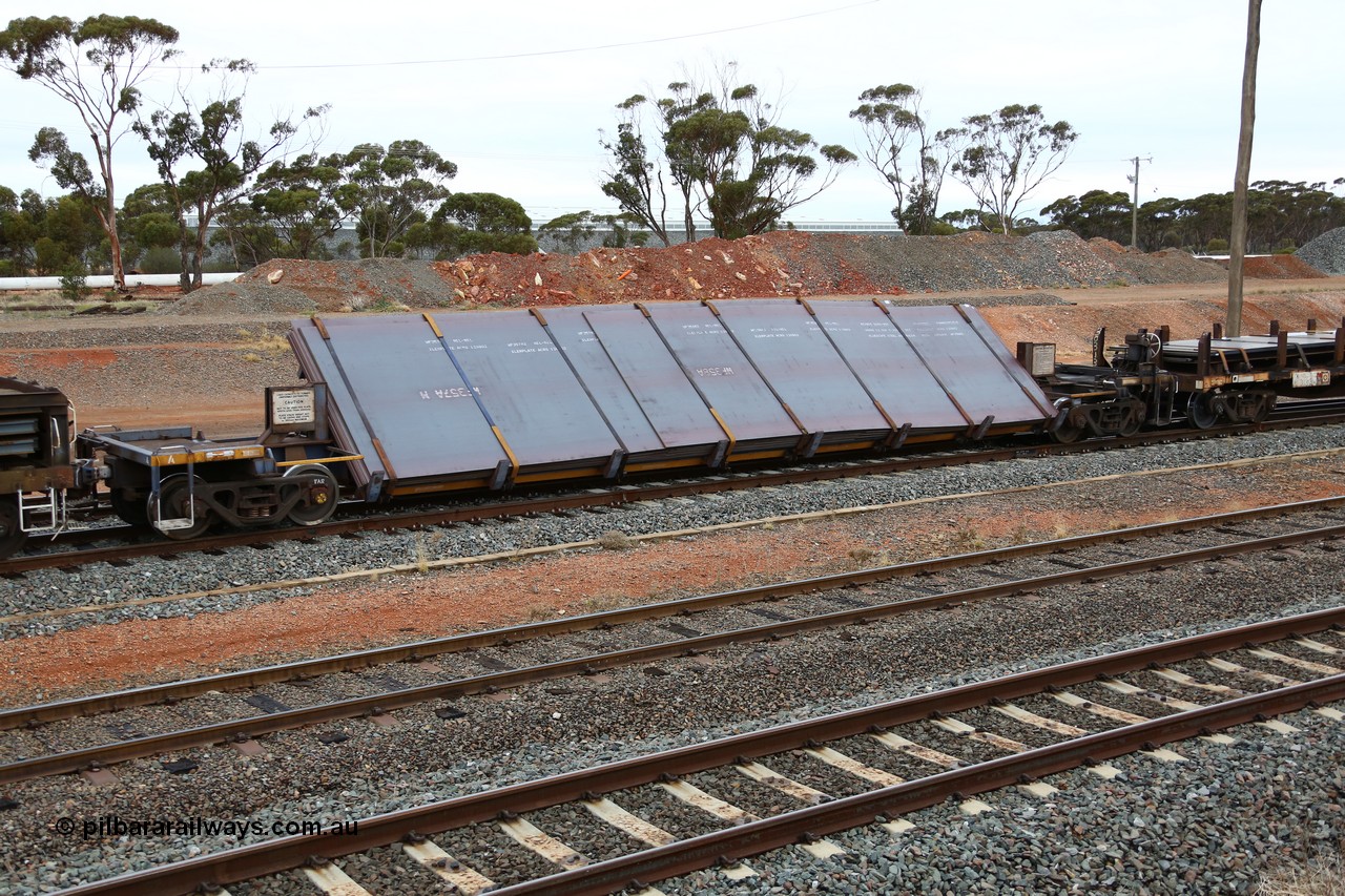 160524 4301
West Kalgoorlie, 1MP2 steel train, RKYY type wide steel plate tilt waggon RKYY 7084 the first of twenty seven units built by AN Rail Islington Workshops in 1995-96. Loaded with steel plate.
Keywords: RKYY-type;RKYY7084;AN-Islington-WS;