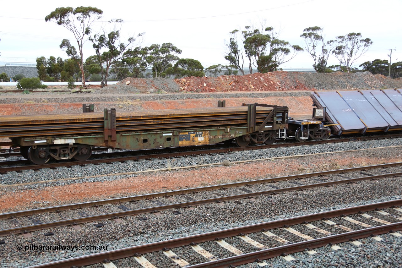 160524 4302
West Kalgoorlie, 1MP2 steel train, RKAX 6, 2-pack rail transport waggon, Platform 2, this waggon was converted by Port Augusta Workshops from two original FBX type waggons built in 1968-69 by Islington Workshops in a batch of twenty later coded AFCX. AKAX 6 and AKCX 14 where the donors for this waggon. Loaded with a full load of rail strings.
Keywords: RKAX-type;RKAX6;SAR-Islington-WS;FBX-type;