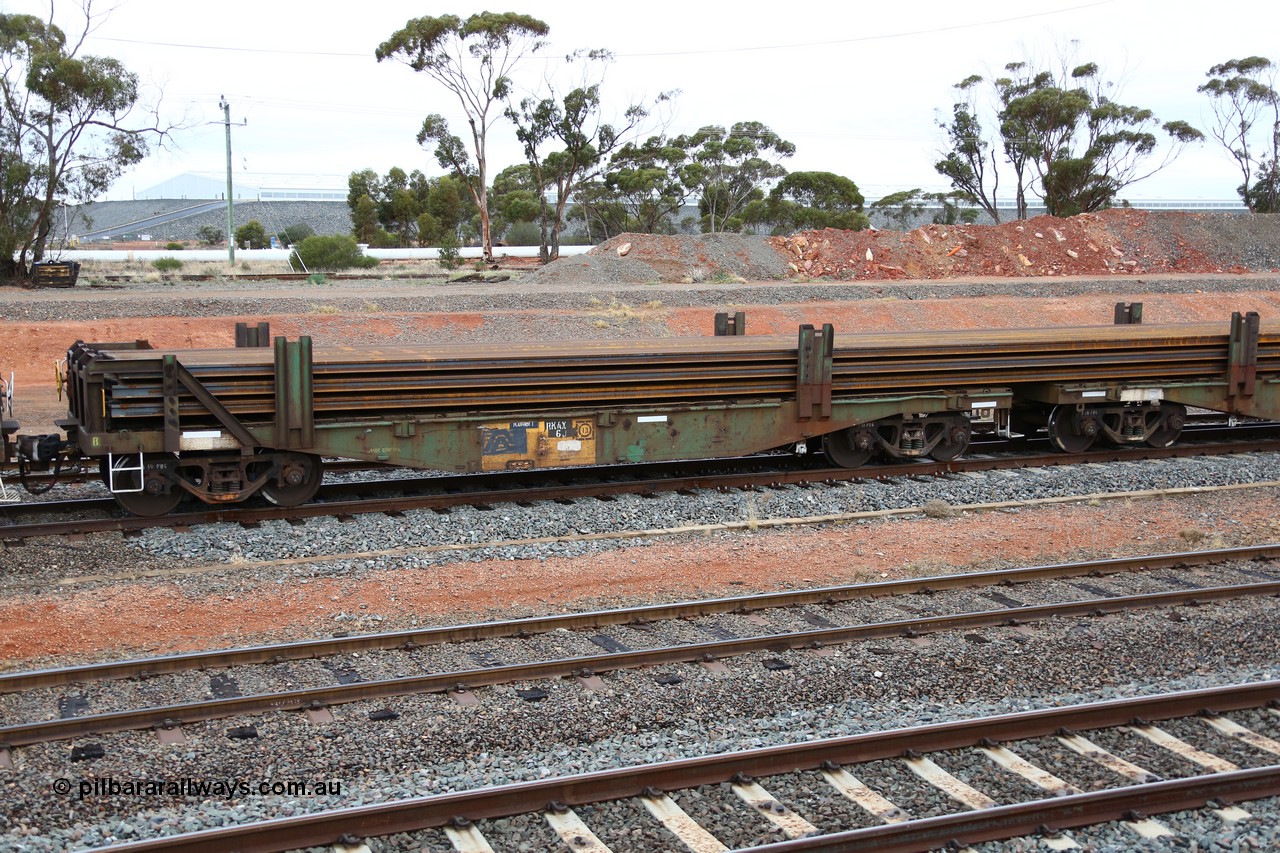 160524 4303
West Kalgoorlie, 1MP2 steel train, RKAX 6, 2-pack rail transport waggon, Platform 1, this waggon was converted by Port Augusta Workshops from two original FBX type waggons built in 1968-69 by Islington Workshops in a batch of twenty later coded AFCX. AKAX 6 and AKCX 14 where the donors for this waggon. Loaded with a full load of rail strings.
Keywords: RKAX-type;RKAX6;SAR-Islington-WS;FBX-type;