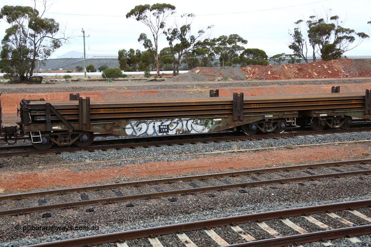 160524 4306
West Kalgoorlie, 1MP2 steel train, RKAX 13, 2-pack rail transport waggon, Platform 1, this waggon was converted by Port Augusta Workshops from two original FBX type waggons built in 1968-69 by Islington Workshops in a batch of twenty later coded AFCX. AFCX 13 & AKAX 5 where the donors for this waggon. Loaded with a full load of rail strings.
Keywords: RKAX-type;RKAX13;SAR-Islington-WS;FBX-type;