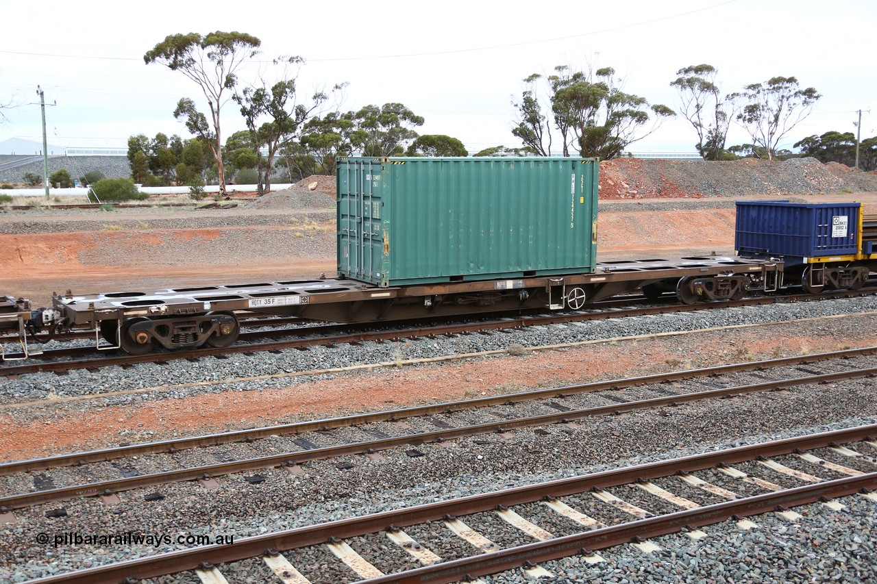 160524 4314
West Kalgoorlie, 1MP2 steel train, RQTY 35 loaded with a Royal Wolf lease 25G1 type 20' box RWLU 724457. Originally built by SAR Islington Workshops as an FQX type waggon in a batch of seventy two between 1970 and 1972.
Keywords: RQTY-type;RQTY35;SAR-Islington-WS;FQX-type;AQCX-type;