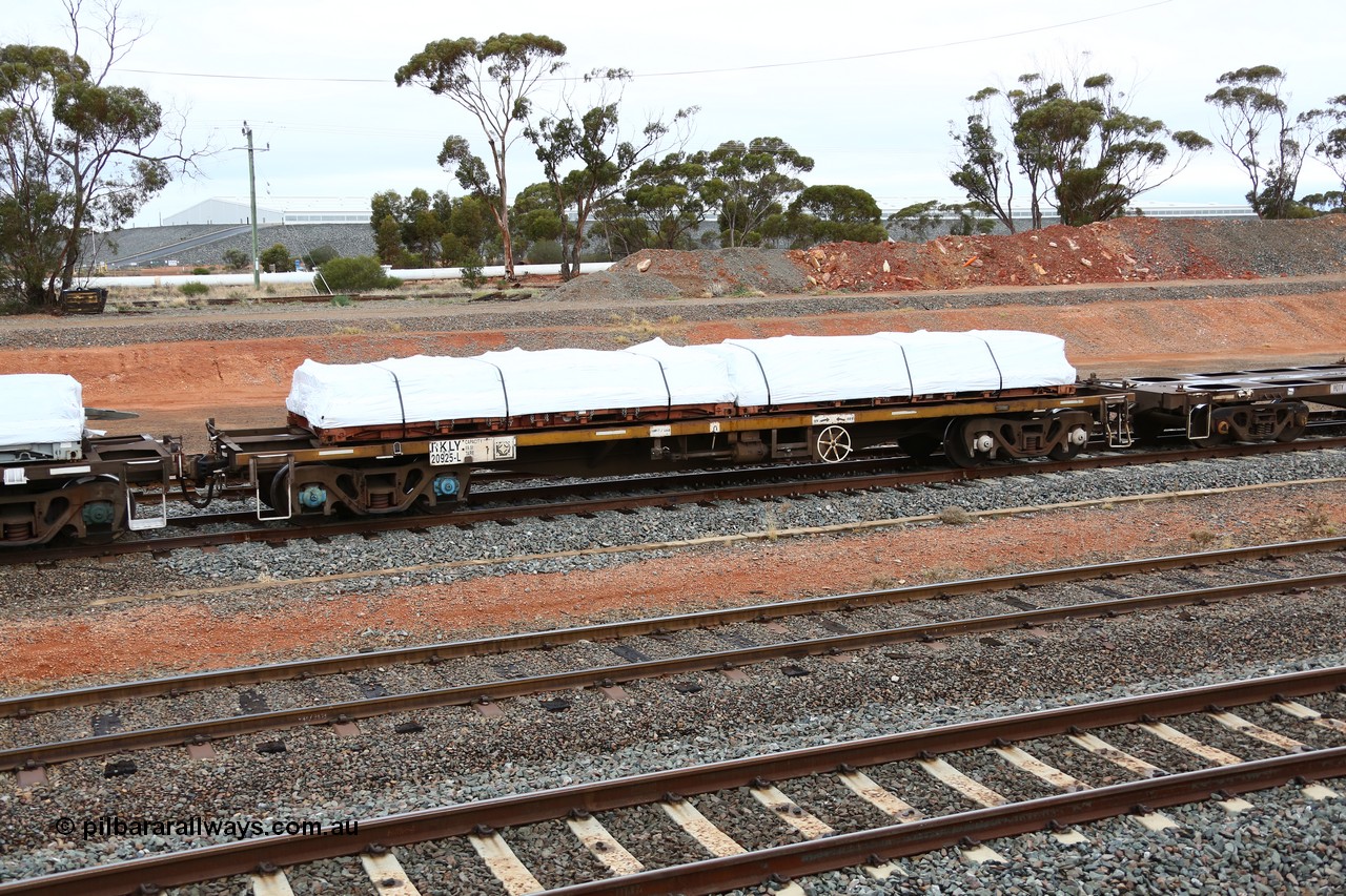 160524 4315
West Kalgoorlie, 1MP2 steel train, container waggon RKLY 20925 with a couple of plastic wrapped flat rack units. Originally built in the third contract of two hundred NODY type open waggons built by EPT NSW in 1980/81. Several recodes later it is fitted for containers, primarily steel traffic.
Keywords: RKLY-type;RKLY20925;EPT-NSW;NODY-type;
