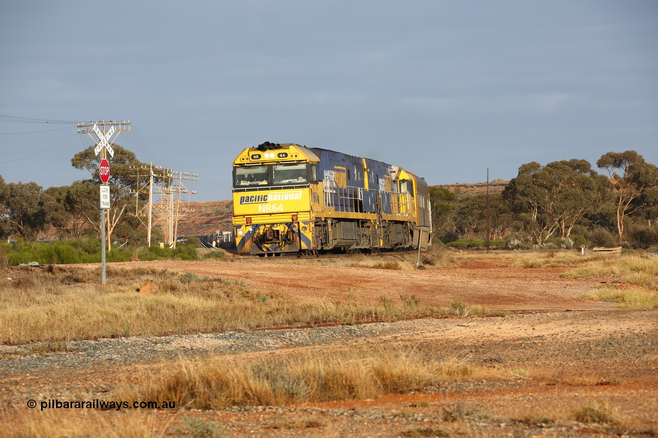 160525 4434
Parkeston, 3PM7 priority service train downgrade over the hill behind Goninan built GE model Cv40-9i NR class units NR 64 serial 7250-11/96-266 and NR 11 serial 7250-02/97-213.
Keywords: NR-class;NR64;Goninan;GE;Cv40-9i;7250-11/96-266;