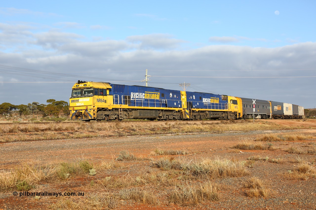 160525 4437
Parkeston, 3PM7 priority service train downgrade over the hill behind Goninan built GE model Cv40-9i NR class units NR 64 serial 7250-11/96-266 and NR 11 serial 7250-02/97-213.
Keywords: NR-class;NR64;Goninan;GE;Cv40-9i;7250-11/96-266;