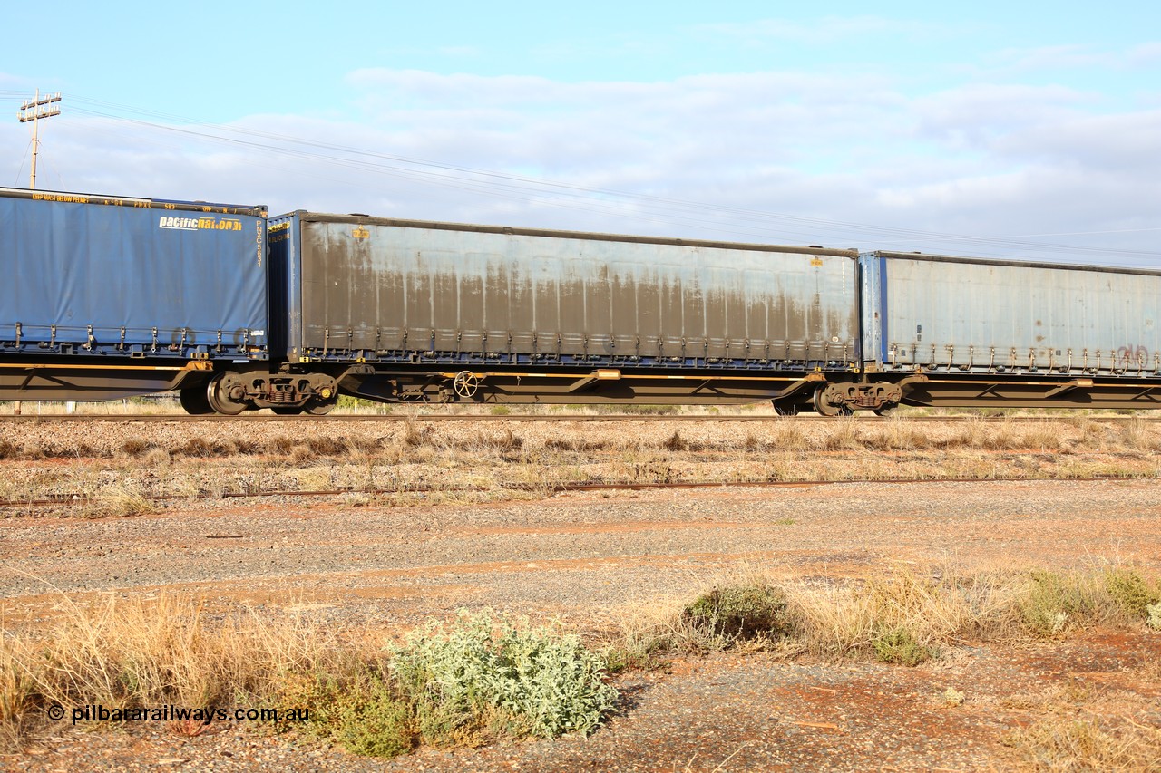 160525 4455
Parkeston, 3PM7 priority service train, RRQY 8408 platform 3 of 5-pack articulated skel waggon, one of thirty four sets built by Qiqihar Rollingstock Works China in 2012, 48' deck with a Pacific National 48' curtainsider PNXM 4542.
Keywords: RRQY-type;RRQY8408;Qiqihar-Rollingstock-Works-China;