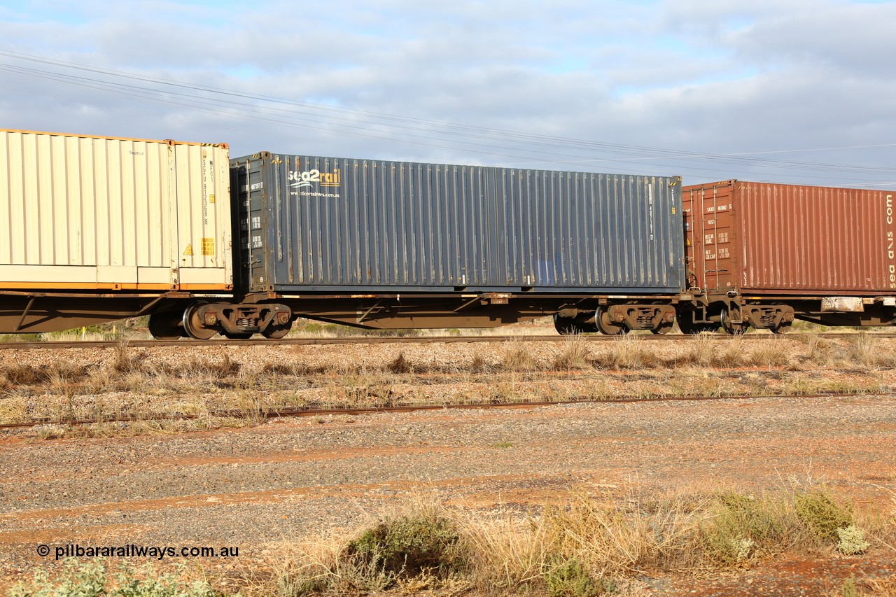 160525 4486
Parkeston, 3PM7 priority service train, RRAY 7249 platform 1 of 5-pack articulated skel waggon set, one of 100 built by ABB Engineering NSW 1996-2000, 40' deck with a blue SCF sea2rail 40' container SCFU 407197.
Keywords: RRAY-type;RRAY7249;ABB-Engineering-NSW;