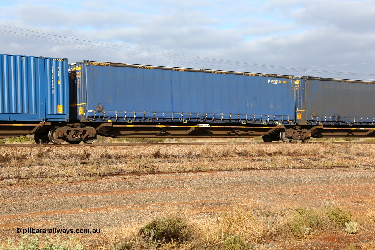 160525 4503
Parkeston, 3PM7 priority service train, RQQY 7079 platform 2 of 5-pack articulated skel waggon set, one of seventeen sets built by Qld Rail at Ipswich Workshops in 1995, 48' Pacific National curtainsider PNXC 5624.
Keywords: RQQY-type;RQQY7079;Qld-Rail-Ipswich-WS;