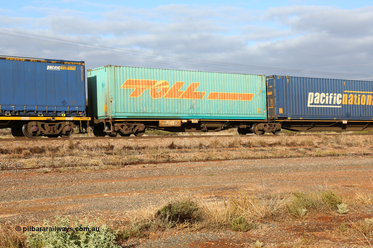 160525 4508
Parkeston, 3PM7 priority service train, RRAY 7255 platform 1 of 5-pack articulated skel waggon set, one of 100 built by ABB Engineering NSW 1996-2000, 40' deck with a Toll 40' box TOLH 910127.
Keywords: RRAY-type;RRAY7255;ABB-Engineering-NSW;