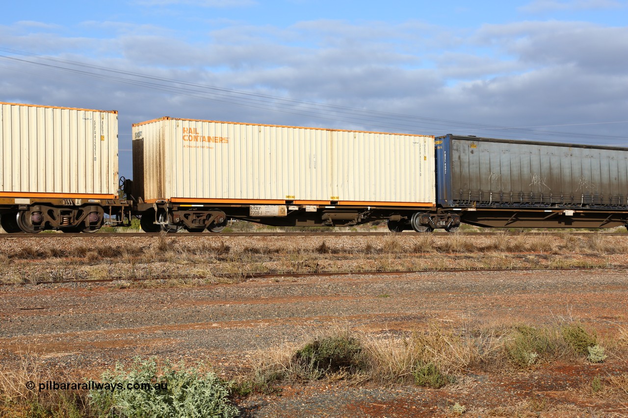 160525 4520
Parkeston, 3PM7 priority service train, RRAY 7208 platform 5 of 5-pack articulated skel waggon set, one of 100 built by ABB Engineering NSW 1996-2000, 40' deck with a 40' Rail Containers sea2rail box SCFU 412065.
Keywords: RRAY-type;RRAY7208;ABB-Engineering-NSW;