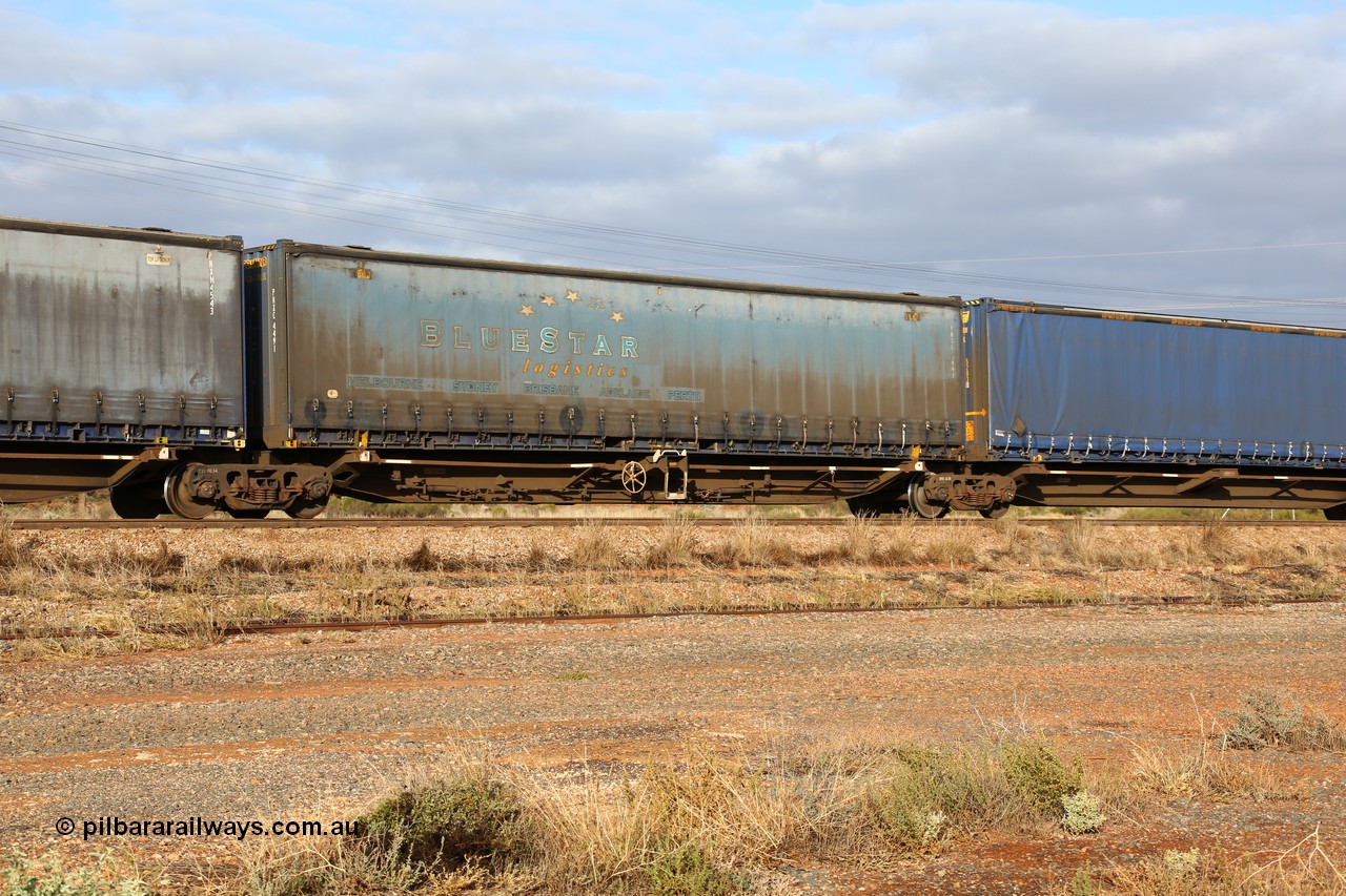 160525 4528
Parkeston, 3PM7 priority service train, RRQY 8344 platform 3 of 5-pack articulated skel waggon set the last of a batch of 41 built by Qiqihar Rollingstock Works China in 2005 for Pacific National, with a Pacific National 48' curtainsider stencilled for Bluestar Logistics PNXC 4491.
Keywords: RRQY-type;RRQY8344;Qiqihar-Rollingstock-Works-China;