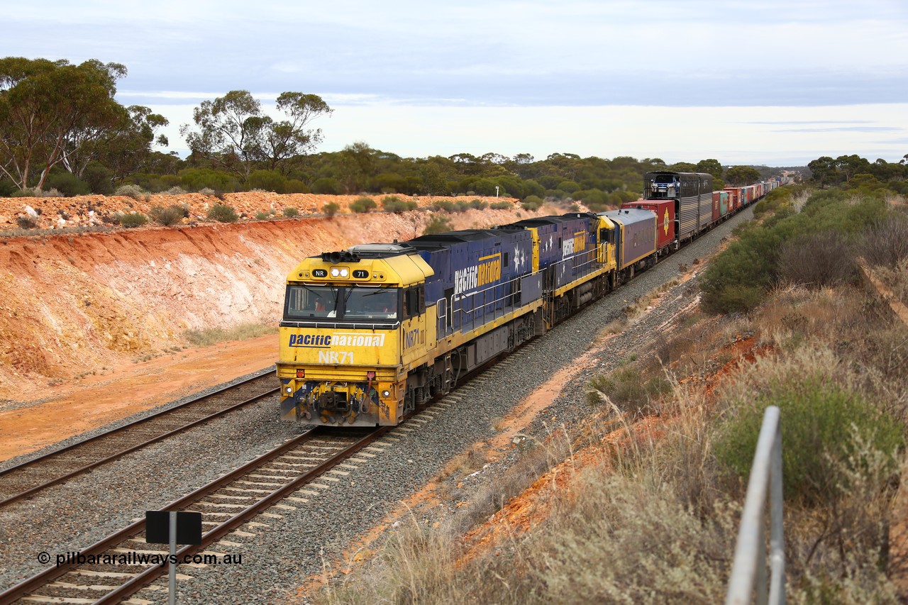 160526 5201
West Kalgoorlie, Melbourne bound intermodal train 4PM6 arrives with Binduli in the distance behind Goninan built GE model Cv40-9i NR class units NR 71 serial 7250-01/97-273 and NR 12 serial 7250-02/97-214.
Keywords: NR-class;NR71;Goninan;GE;Cv40-9i;7250-01/97-273;