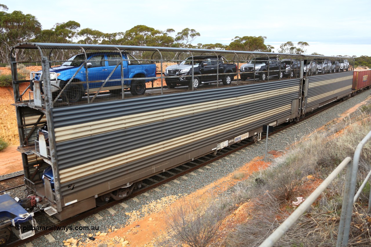 160526 5205
West Kalgoorlie, 4PM6 intermodal train, RMEY 3160 articulated 2-pack triple deck automobile waggon, converted by Cheeseman Engineering in 2004 from former 1971 vintage AE Goodwin built GNX automobile waggons with a full six decks of motor vehicles.
Keywords: RMEY-type;RMEY3160;Cheeseman-Engineering-SA;AE-Goodwin;GNX-type;AMNX-type;