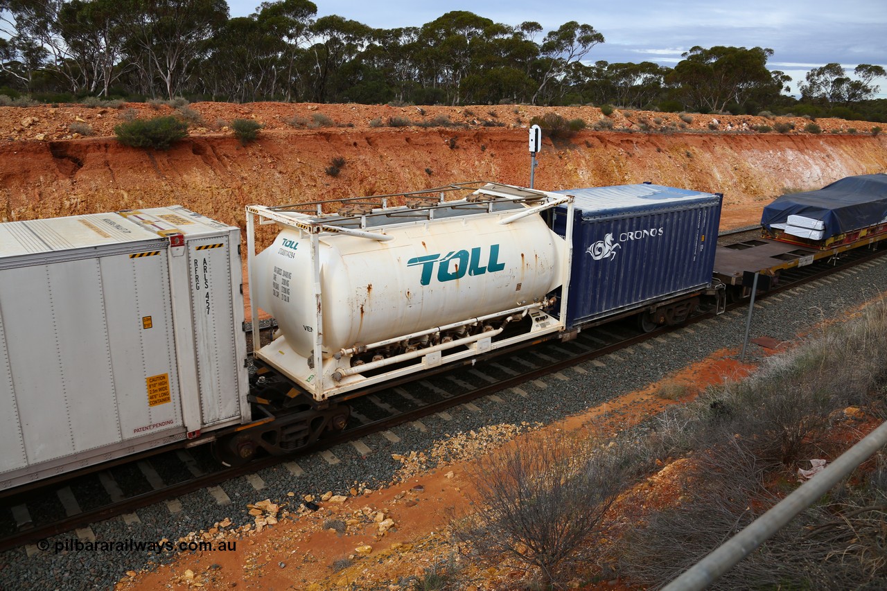 160526 5212
West Kalgoorlie, 4PM6 intermodal train, RRAY 7167 platform 5 of 5-pack articulated skel waggon set, one of a hundred built by ABB Engineering NSW in 1996-2000, 40' deck with a 20' Toll tanktainer JTSU 011429 and a Cronos tarp top 20 box CXSU 122034.
Keywords: RRAY-type;RRAY7167;ABB-Engineering-NSW;