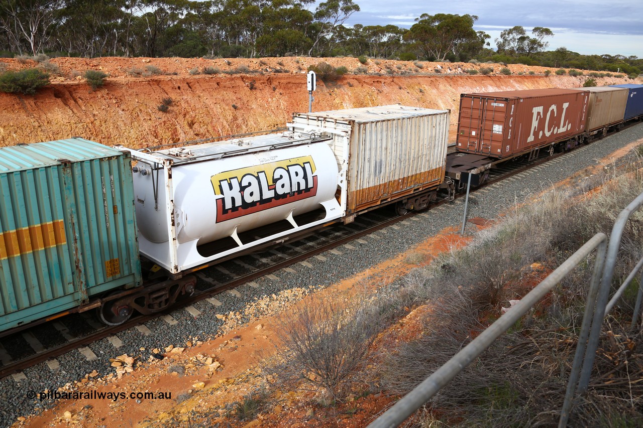 160526 5217
West Kalgoorlie, 4PM6 intermodal train, RRAY 7216 platform 1 of 5-pack articulated skel waggon set, one of 100 built by ABB Engineering NSW 1996-2000, 40' deck with a Jamieson built 20' Kalari tanktainer K8119, and a 20' bulker box NB 29530
Keywords: RRAY-type;RRAY7216;ABB-Engineering-NSW;