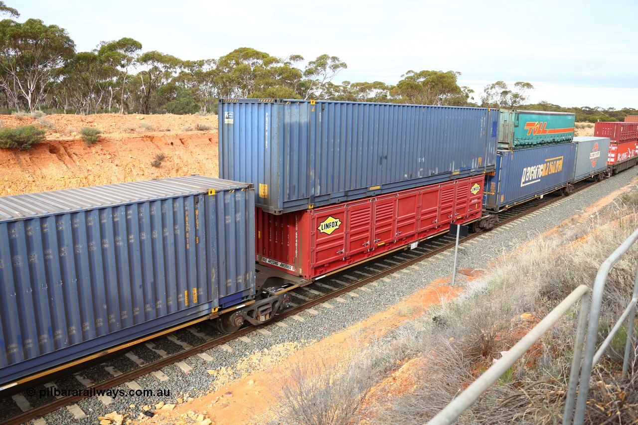 160526 5223
West Kalgoorlie, 4PM6 intermodal train, RRAY 7260 platform 3 of 5-pack articulated skel waggon set, one of a hundred built by ABB Engineering NSW in 1996-2000, 48' deck with a 40' Linfox half height side door LSDU 694010 and a Pacific National 48' Royal Wolf box PNXD 4165 on top.
Keywords: RRAY-type;RRAY7260;ABB-Engineering-NSW;