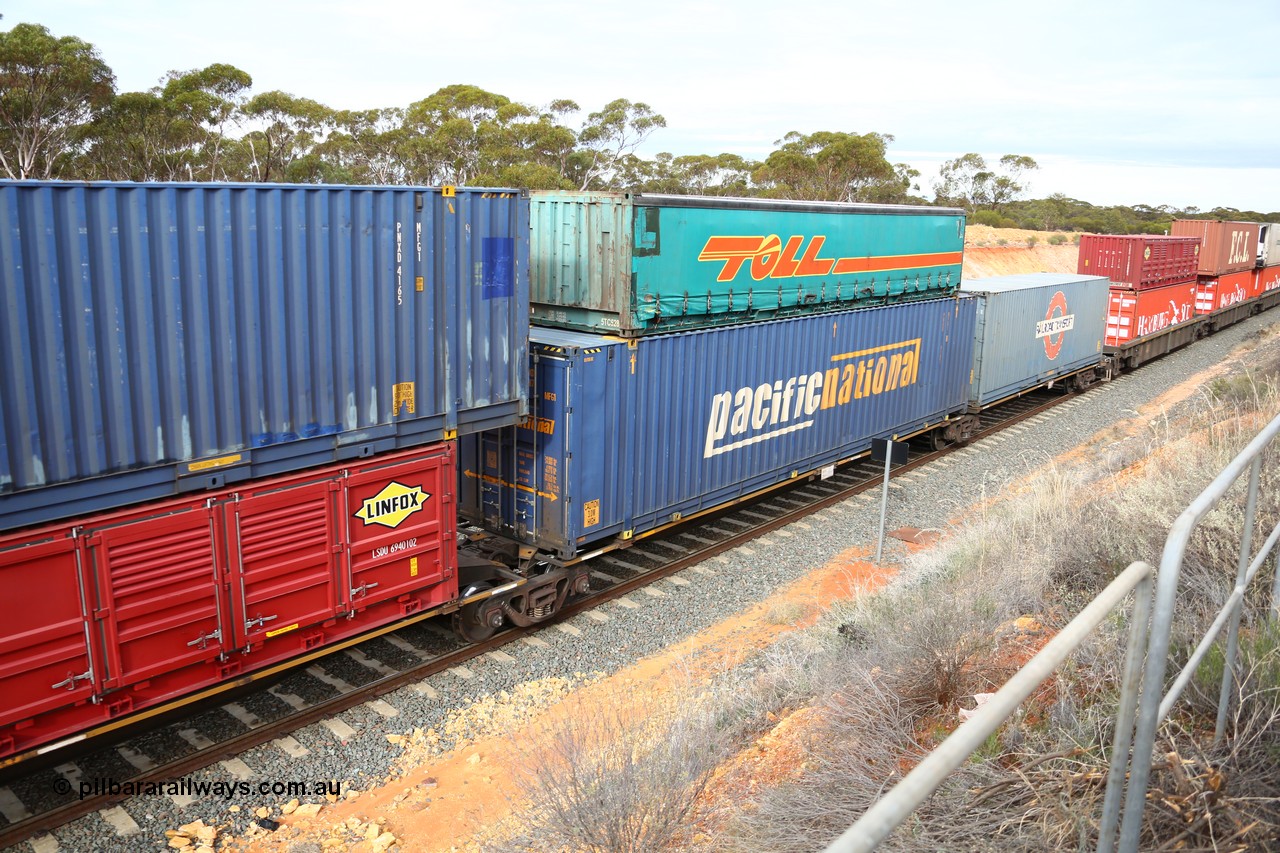 160526 5224
West Kalgoorlie, 4PM6 intermodal train, RRAY 7260 platform 4 of 5-pack articulated skel waggon set, one of a hundred built by ABB Engineering NSW in 1996-2000, 48' deck with a 48' Pacific National box PNXD 4187 with a Toll half height 40' curtainsider 5TC 528 on top.
Keywords: RRAY-type;RRAY7260;ABB-Engineering-NSW;