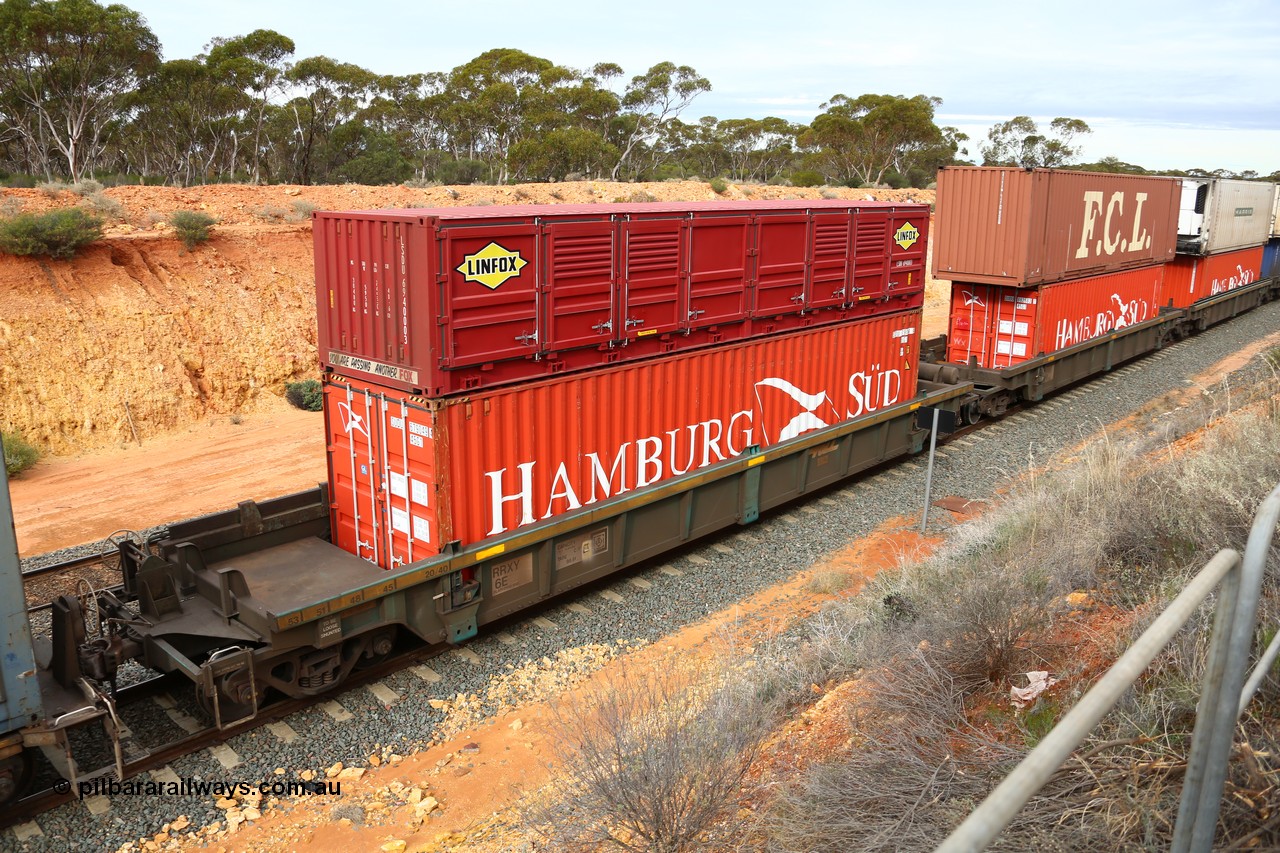 160526 5226
West Kalgoorlie, 4PM6 intermodal train, RRXY 6 platform 5 of 5-pack well waggon set, one of eleven built by Bradken Qld in 2002 for Toll from a Williams-Worley design with a 40' Hamburg Sud box SUDU 679049 in the well and a 40' Linfox half height side door unit LSDU 694000 on top.
Keywords: RRXY-type;RRXY6;Williams-Worley;Bradken-Rail-Qld;