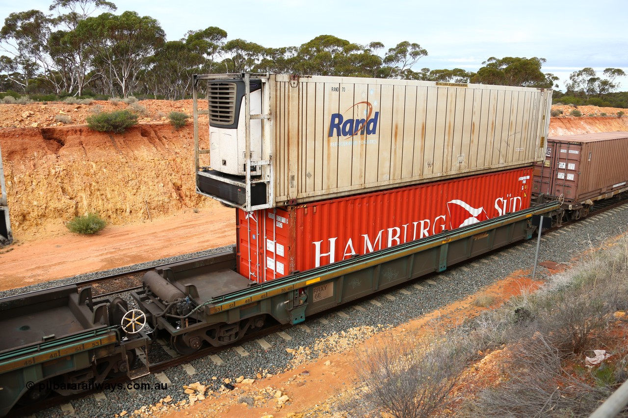 160526 5230
West Kalgoorlie, 4PM6 intermodal train, RRXY 6 platform 1 of 5-pack well waggon set, one of eleven built by Bradken Qld in 2002 for Toll from a Williams-Worley design with a 40' Hamburg Sud box SUDU 673010 in the well and a RAND Refrigerated Logistics 46' reefer RAND 70 on top.
Keywords: RRXY-type;RRXY6;Williams-Worley;Bradken-Rail-Qld;