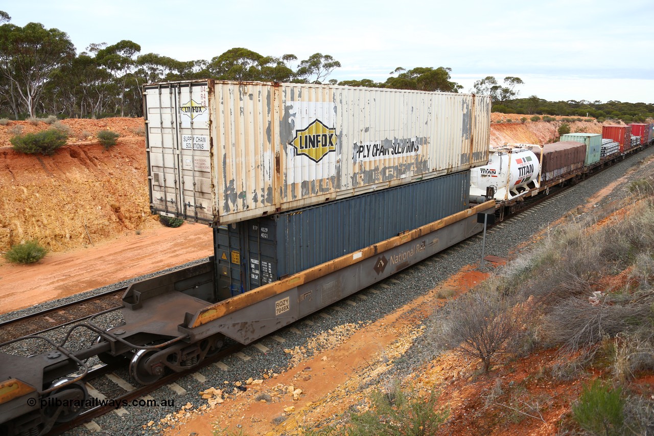 160526 5247
West Kalgoorlie, 4PM6 intermodal train, RQZY 7048 one of thirty two 5-pack well waggon sets built by Goninan in 1995 for National Rail in 1995-96, well contains a 40' RTP 4029 and a Linfox 53' box on top, DRC 448.
Keywords: RQZY-type;RQZY7048;Goninan-NSW;