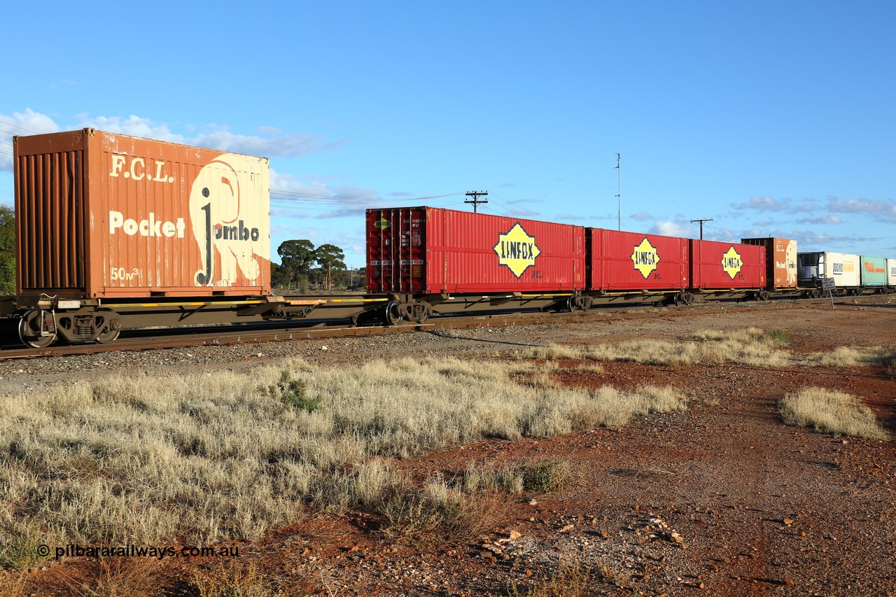 160528 8323
Parkeston, priority service 6PS7, RQQY 7083 5-pack articulated skel waggon set, one of seventeen sets built by Qld Rail at Ipswich Workshops in 1995, loaded with two 20' FCL Pocket Jumbo 50 m3 boxes and three MFG1 type 48' Linfox - FCL boxes.
Keywords: RQQY-type;RQQY7083;Qld-Rail-Ipswich-WS;