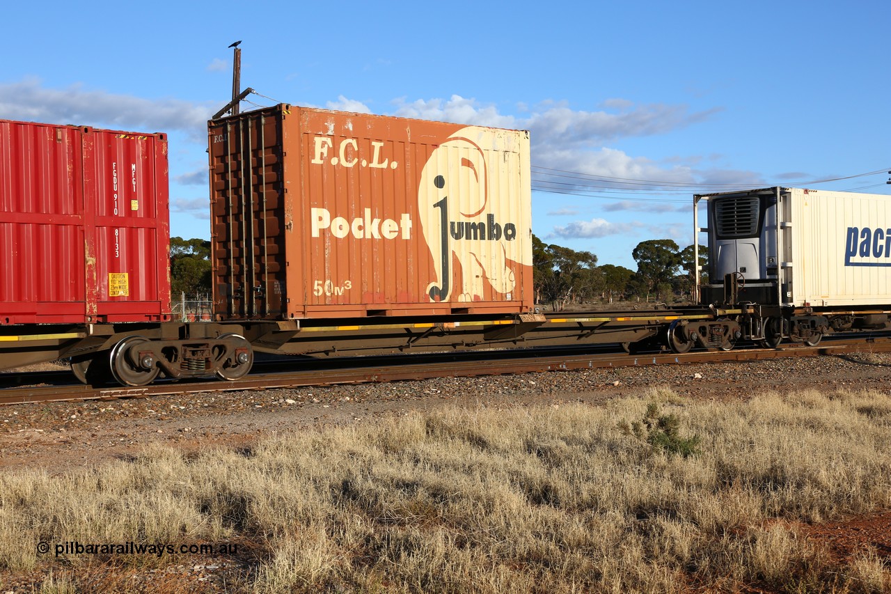 160528 8325
Parkeston, priority service 6PS7, RQQY 7083 platform 1 of 5-pack articulated skel waggon set, one of seventeen sets built by Qld Rail at Ipswich Workshops in 1995, with an FCL 20' Pocket Jumbo 50 m3 box FPJG 201010.
Keywords: RQQY-type;RQQY7083;Qld-Rail-Ipswich-WS;