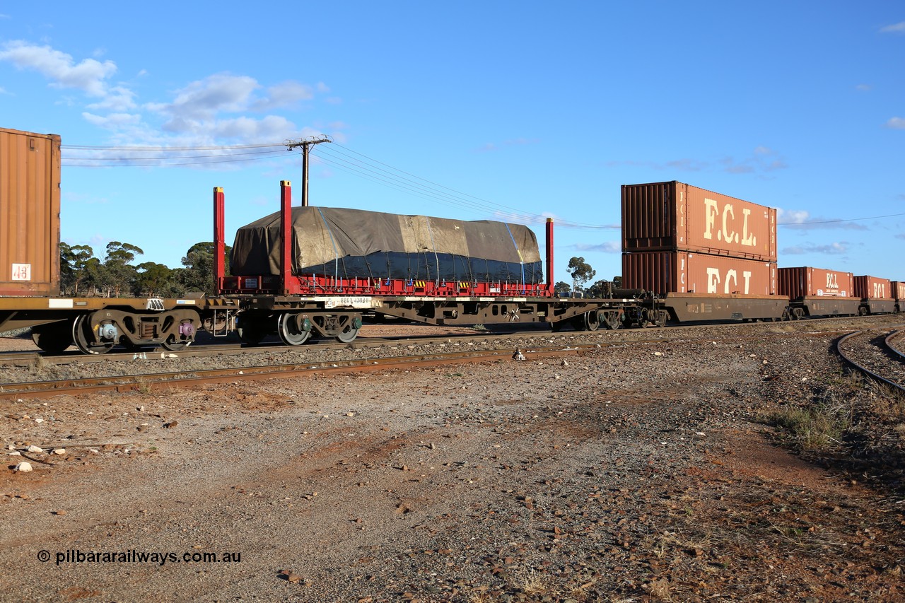 160528 8344
Parkeston, 5SP5 intermodal train, RRKY container waggon RRKY 4302, originally built as an RMX type 63' flat waggon by Perry Engineering SA in 1975. Recoded to AQMX, then AQMY and RQMY. Loaded with a Linfox 40' flat rack FCCU 4010# with a tarped load.
Keywords: RRKY-type;RRKY4302;Perry-Engineering-SA;RMX-type;AQMX-type;AQSY-type;RQKY-type;