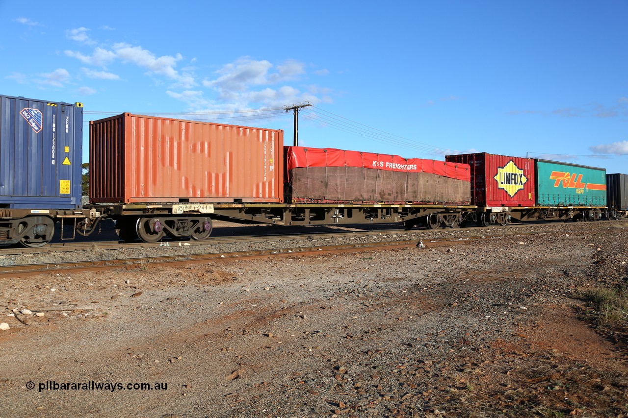 160528 8353
Parkeston, 5SP5 intermodal train, RQKY 2741 originally built by Perry Engineering SA in 1975 as an RMX type motor vehicle flat waggon, recoded to AQMX then AQSY in 1991, to current code in 1994. Loaded with 22G1 type 20' box TCKU 191912 and K+S 40' flat rake with a tarped load.
Keywords: RQKY-type;RQKY2741;Perry-Engineering-SA;RMX-type;AQMX-type;