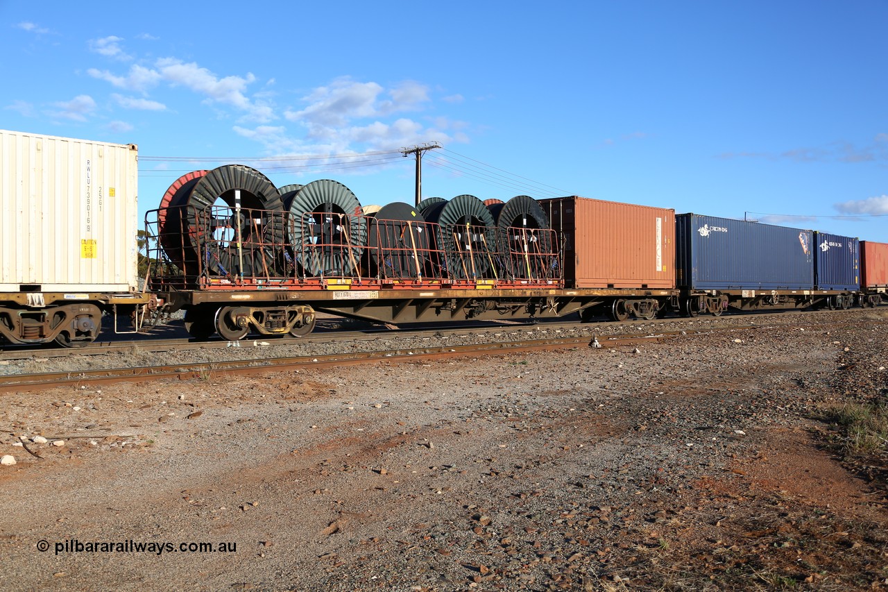 160528 8355
Parkeston, 5SP5 intermodal train, RQTY 670 originally built by Victorian Railways Newport Workshops between 1969-72 as part of a batch of two hundred FQX type container waggons, recoded to FQF type in Nov 1977, to VQCX in c1979, April 1994 to National Rail as RQCX. With a 40' Simon flat rack FD189 with cable drums and a 20' Grace box GR 1031.
Keywords: RQTY-type;RQTY670;Victorian-Railways-Newport-WS;FQX-type;