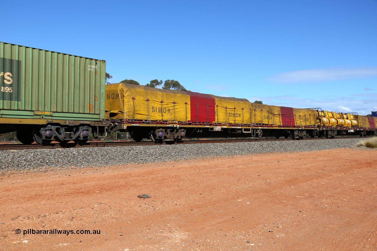 160528 8402
Binduli, intermodal train 6PM6, RQPW 60053 80' jumbo container waggon with two 40' FD flatracks with tarped Simon loads, FD 192. Originally built by Victorian Railways Bendigo Workshops in 1984 as part of fifty VQDW type jumbo container waggons. In the late 80's leased to NSW and recoded to NQMW and renumbered to current number. To National Rail in 1994/95.
Keywords: RQPW-type;RQPW60053;Victorian-Railways-Bendigo-WS;VQDW-type;VQDW30;NQWM-type;