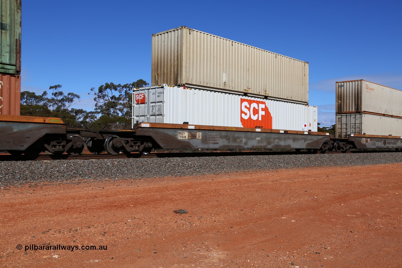 160528 8418
Binduli, intermodal train 6PM6, RRZY type five unit bar coupled well container waggon set RRZY 7016 platform 4, originally built by Goninan in a batch of twenty six RQZY type for National Rail, recoded when repaired. SCF 48' 4MFG type container SCFU 415203 double stacked with 40' 4FG1 type Austrans container AUCU 412418.
Keywords: RRZY-type;RRZY7016;Goninan-NSW;RQZY-type;