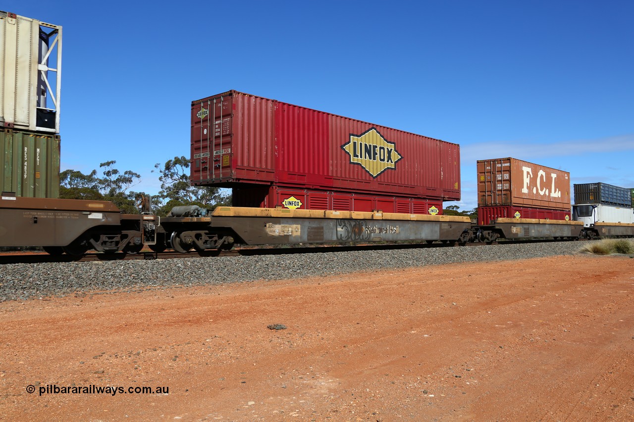 160528 8453
Binduli, intermodal train 6PM6, RRZY type five unit bar coupled well container waggon set RRZY 7039 platform 5, one of thirty two waggon sets built by Goninan in 1995-96 for National Rail as the RQZY type and recoded when repaired. Loaded with a 40' Linfox half height side door container LSDU and double stacked with a Linfox 53' PFG1 type car container DRC 5460.
Keywords: RRZY-type;RRZY7039;Goninan-NSW;RQZY-type;