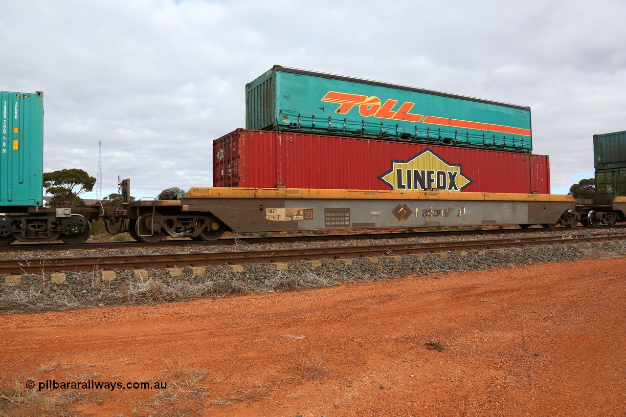 160529 8772
Parkeston, 6MP4 intermodal train, RRZY 7049 platform 5 of 5-pack well waggon set, one of thirty two sets built by Goninan NSW in 1995-96 for National Rail as RQZY type, recoded to RRZY when repaired with a Linfox 48' MFG1 type container DRC 572 and Toll half height 40' curtainsider 5TC 226.
Keywords: RRZY-type;RRZY7049;Goninan-NSW;RQZY-type;