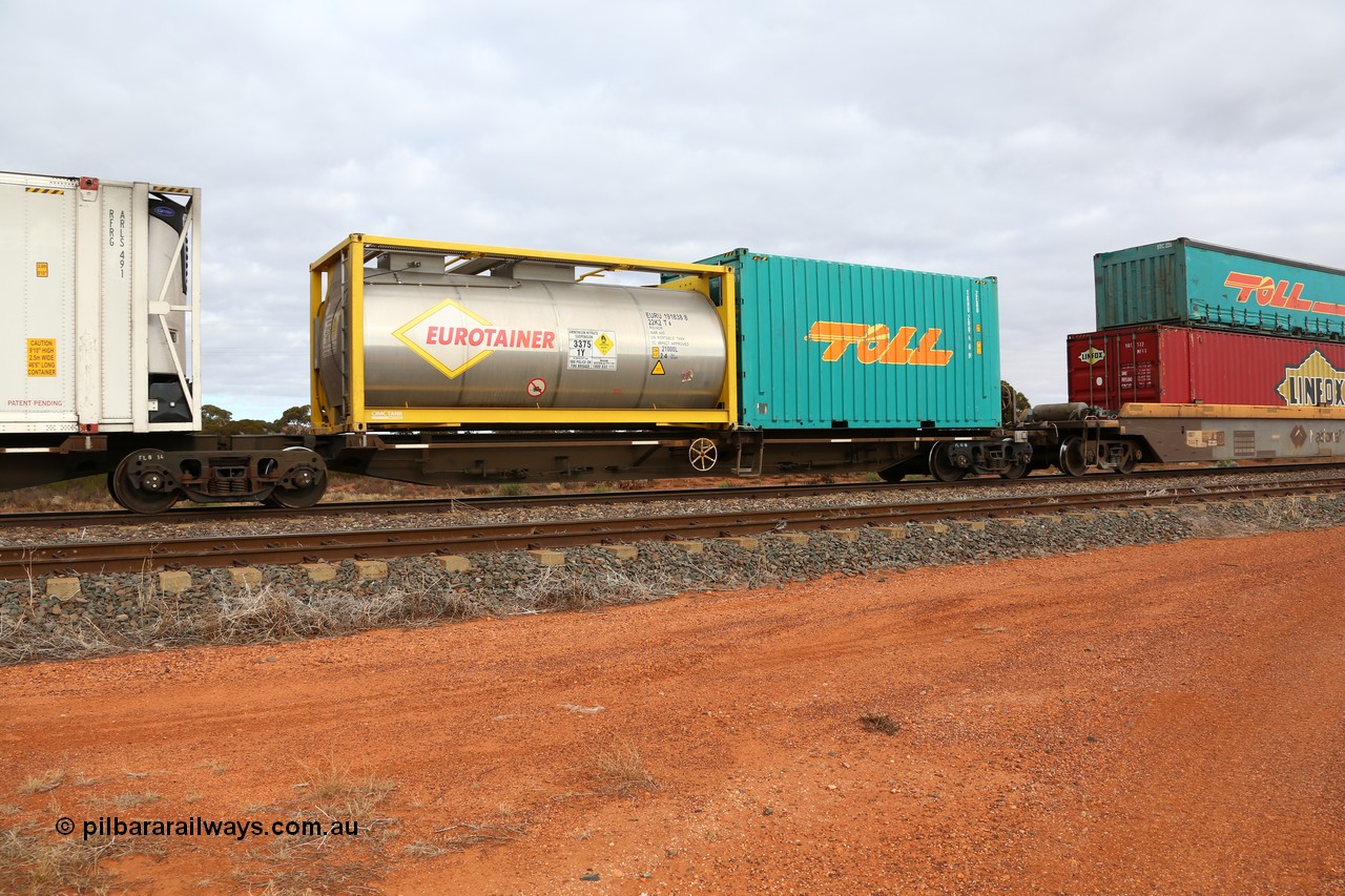 160529 8773
Parkeston, 6MP4 intermodal train, RRQY 7324 platform 1 of 5-pack articulated skel waggon set built by Qiqihar Rollingstock Works China in 2005 in a batch of twenty nine for Pacific National with a 20' ISO tanktainer built by CIMC Tank for Eurotainer 22K2 type EURU 191838 and a Toll 20' 2EB0 type box TQHU 200270.
Keywords: RRQY-type;RRQY7324;Qiqihar-Rollingstock-Works-China;