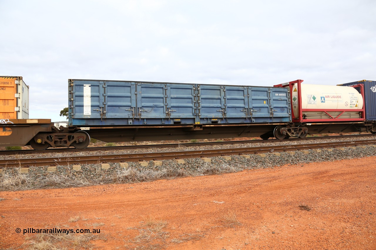 160529 8782
Parkeston, 6MP4 intermodal train, RQLY 1007 an articulated five unit container waggon with centre well, one of a batch of fourteen built by AN Rail Islington Workshops in 1991 as AQLY type, platform 3 centre well loaded with Royal Wolf 20' 25G1 type box RWPU 302904 and a Rail Containers 20' 2NG2 type side door container TSBD 310056.
Keywords: RQLY-type;RQLY1007;AN-Islington-WS;AQLY-type;