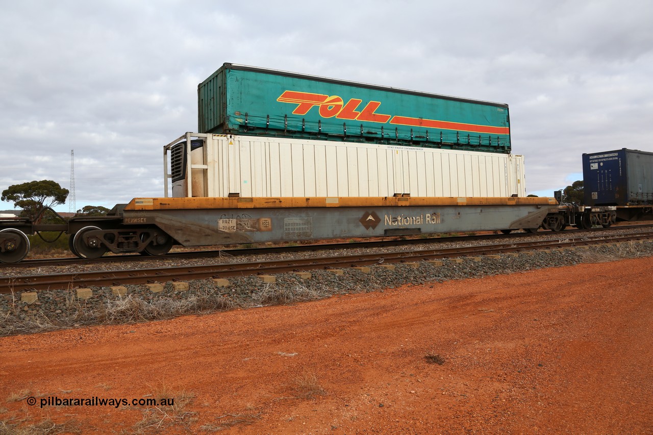 160529 8789
Parkeston, 6MP4 intermodal train, RQZY 7045 platform 5 of 5-pack well waggon set, one of thirty two sets built by Goninan NSW in 1995-96 for National Rail loaded with 46' Pacific National MPR1 type reefer PNXR 4835 and a Toll 40' half height curtainsider 5TC 514.
Keywords: RQZY-type;RQZY7045;Goninan-NSW;