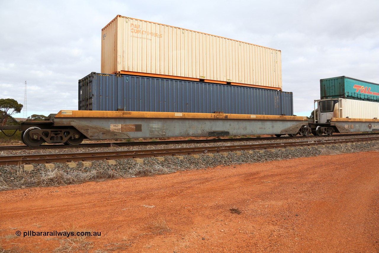 160529 8790
Parkeston, 6MP4 intermodal train, RQZY 7045 platform 4 of 5-pack well waggon set, one of thirty two sets built by Goninan NSW in 1995-96 for National Rail with a 48' Pacific National MFG1 type box PNXD 011 and a Rail Containers 40' 4EG1 type box TSPD 411019.
Keywords: RQZY-type;RQZY7045;Goninan-NSW;