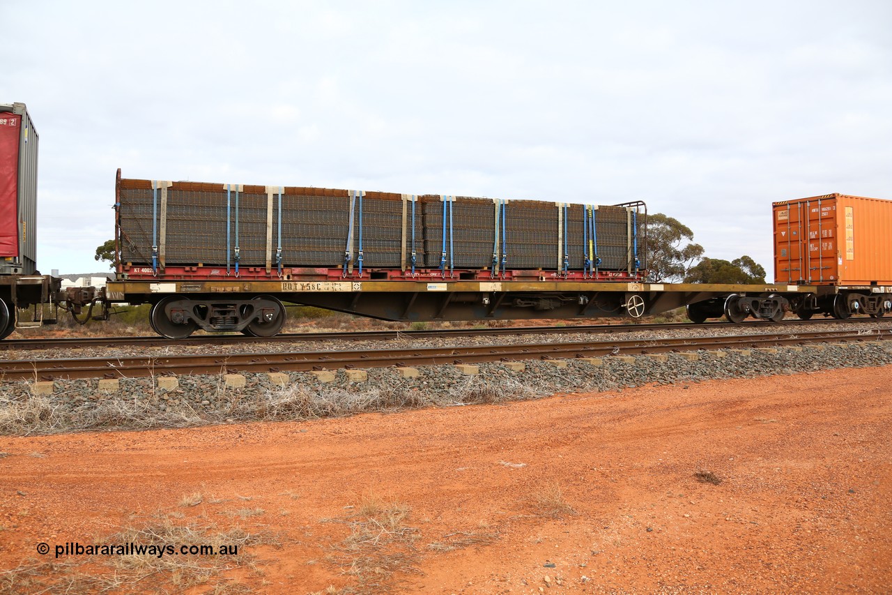 160529 8798
Parkeston, 6MP4 intermodal train, RQTY 58, originally built by SAR at Islington Workshops between 1970-72 as part of a batch of seventy two FQX type container waggons. Loaded with an K+S Freighters 40' flat rack KT 400250 with reo mesh.
Keywords: RQTY-type;RQTY58;SAR-Islington-WS;FQX-type;