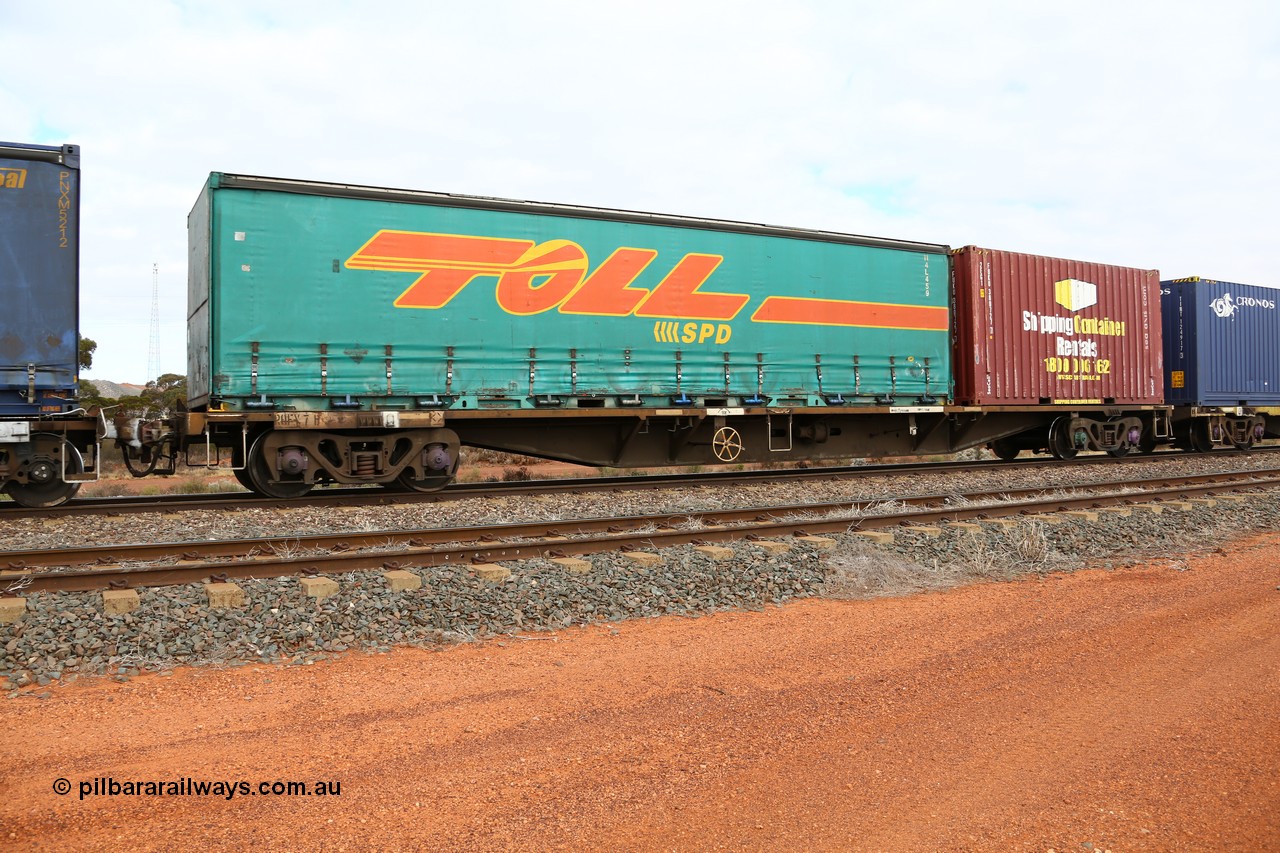 160529 8816
Parkeston, 6MP4 intermodal train, RQFY 7 container waggon, built by Victorian Railways Bendigo Workshops in April 1978 in a batch of forty QMX type skeletal container waggons, in July 1980 re-coded to VQFX, in October 1994 re-coded to RQFX and 2CM bogies fitted.
Keywords: RQFY-type;RQFY7;Victorian-Railways-Bendigo-WS;QMX-type;