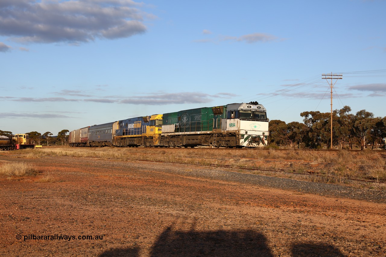 160529 9079
Parkeston, 7MP7 priority service train powers around the curve as it climbs the grade to Kalgoorlie behind a pair of Goninan built GE model Cv40-9i NR class units NR 84 serial 7250-04/97-286 and NR 80 serial 7250-03/97-282. NR 84 wears the Southern Spirit livery and is known as the Minty. Off to the left is Loongana Lime shunt loco DE 49, a former BHP 37 class unit built by Goninan in 1961 based on GE 80 ton switcher, serial 4970-013.
Keywords: NR-class;NR84;NR80;Goninan;GE;Cv40-9i;7250-04/97-286;7250-03/97-282;