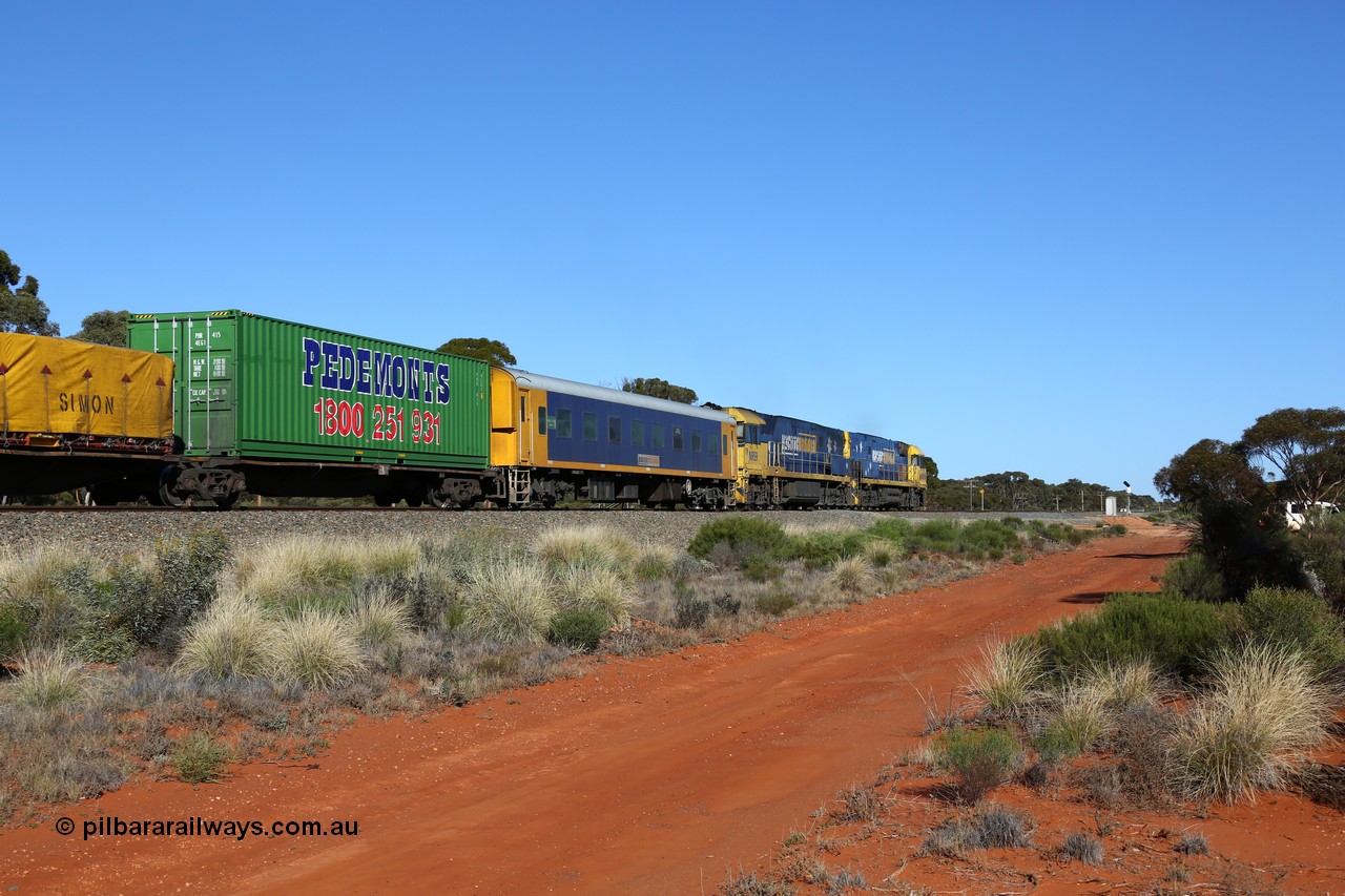 160530 9249
Binduli, 7SP3 intermodal service west bound, crew accommodation coach BRS 223, originally built by Victorian Railways Newport Workshops as an AS class AS 12, then ABS 1, BRS 3. The Pedemonts 40' container PHR 415 is on RRAY 7239, an ABB Engineering built unit from 1996-2000.
Keywords: BRS-type;BRS223;Victorian-Railways-Newport-WS;AS-type;AS12;ABS-type;ABS1;BRS-type;BRS3;