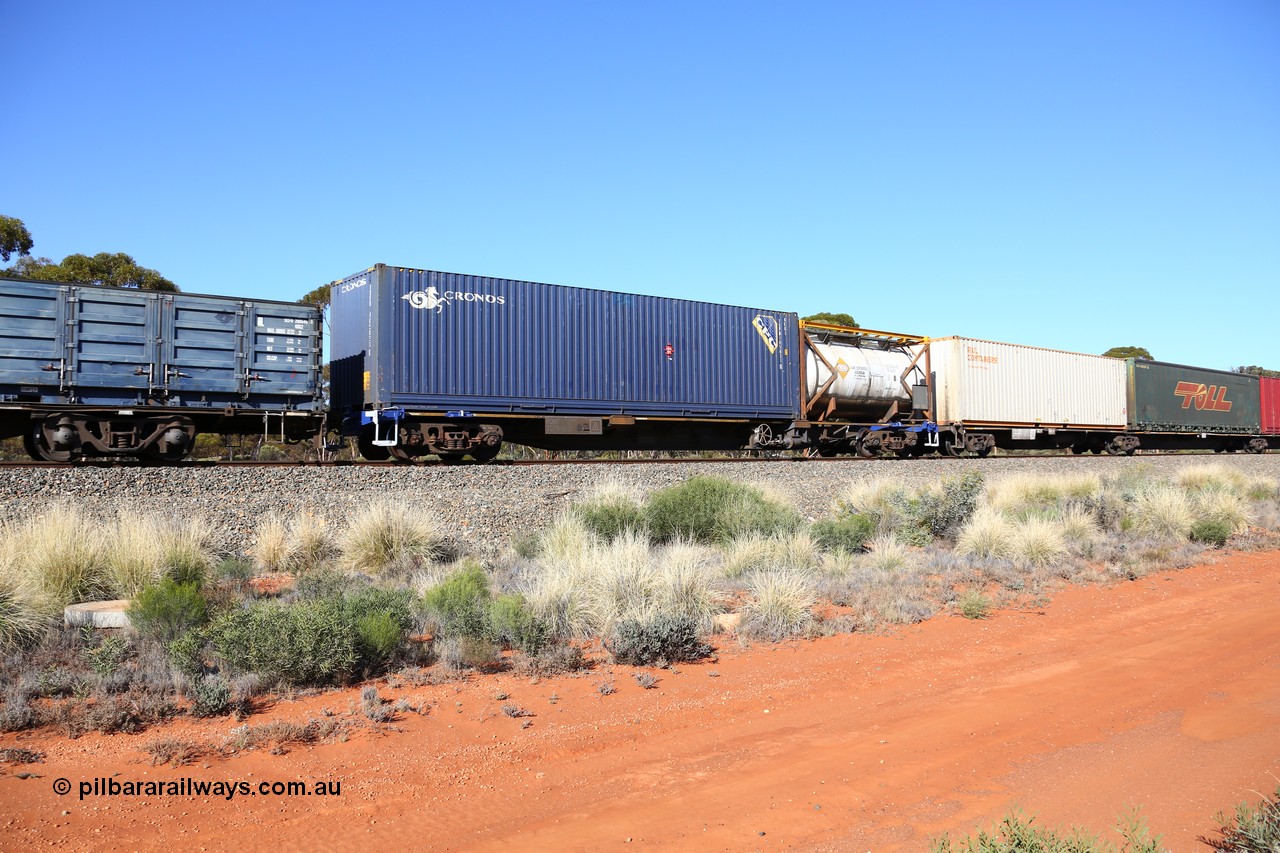 160530 9250
Binduli, 7SP3 intermodal service, container waggon RQHY 7075 one of seventy eight built in 2005 by Qiqihar Rollingstock Works in China, loaded with a Tank Containers Australia 20' tanktainer and an Cronos 40' TSPD 105831 container.
Keywords: RQHY-type;RQHY7075;Qiqihar-Rollingstock-Works-China;