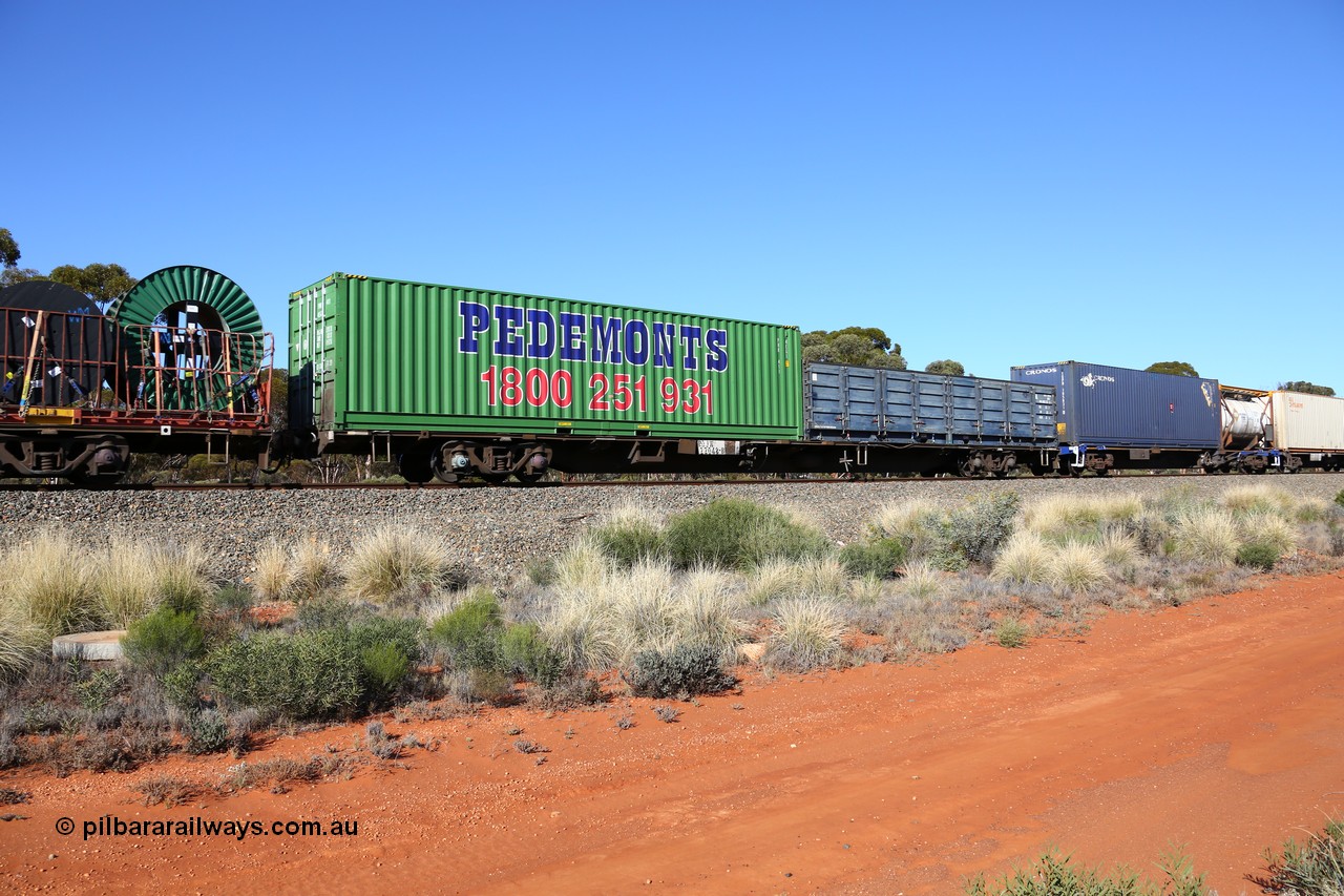 160530 9251
Binduli, 7SP3 intermodal service, container waggon RQJW 22048, one of fifty built by Mittagong Engineering NSW in 1975-76 as JCW type, recoded to NQJW. Loaded with an SCF 40' half height side door container and a Pedemonts PHR 411 40' container.
Keywords: RQJW-type;RQJW22048;Mittagong-Engineering-NSW;JCW-type;NQJW-type;