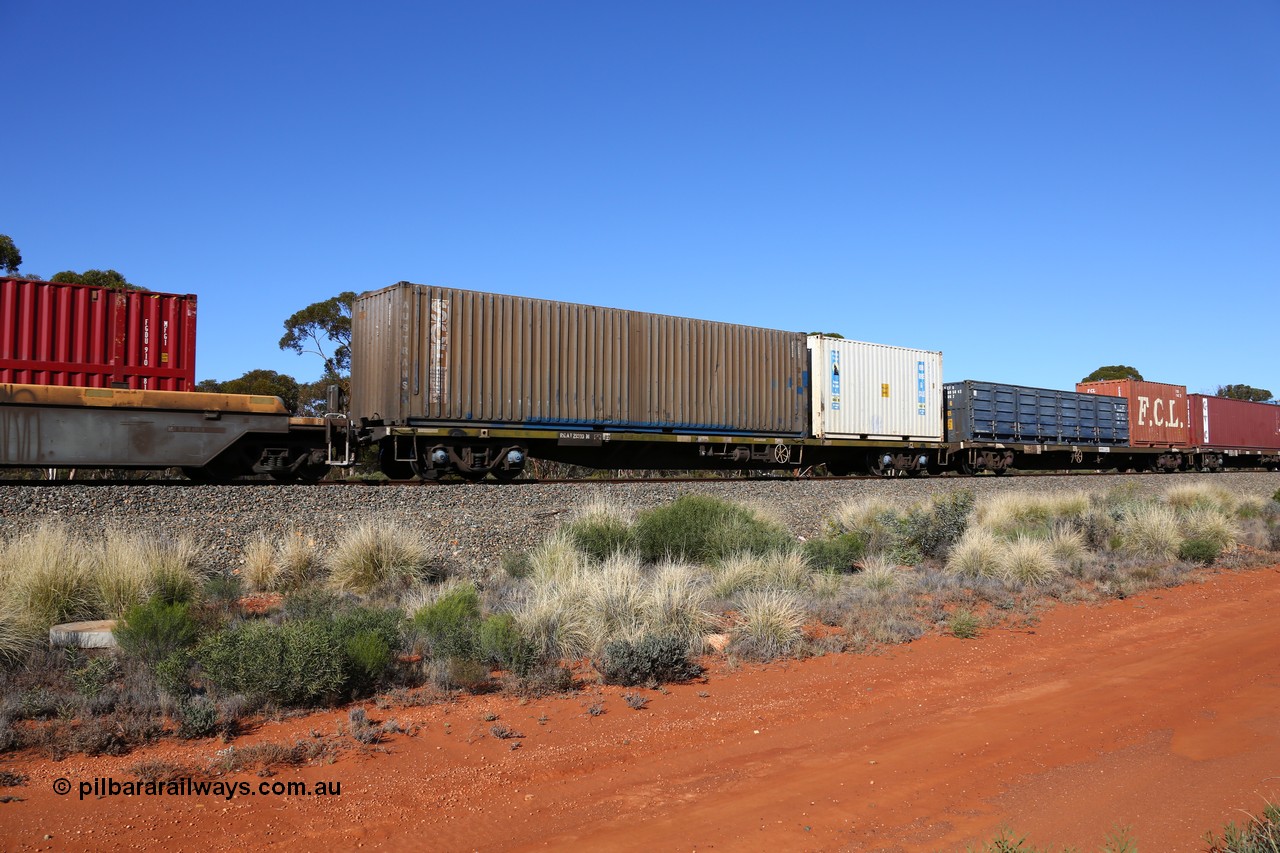 160530 9255
Binduli, 7SP3 intermodal service, container waggon RQAY 21910, one of a hundred such waggons built in 1981 by EPT NSW as type NQAY, recoded to RQAY in 1994. 20' Royal Wolf RWPU 200499 container and 40' SCF Austrans AUSU 470475 container.
Keywords: RQAY-type;RQAY21910;EPT-NSW;NQAY-type;