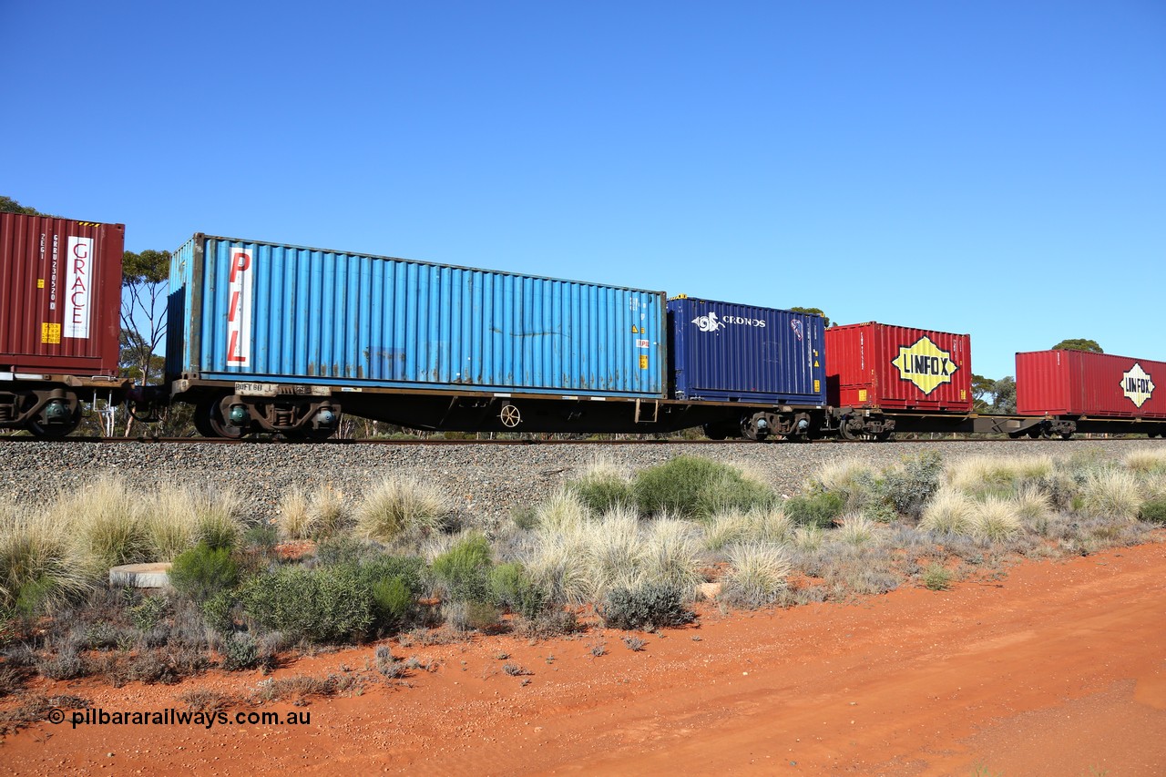 160530 9261
Binduli, 7SP3 intermodal service, RQFY 60 container waggon, built by Victorian Railways Newport Workshops in 1978 in a batch of twenty as QMX type skeletal container waggons, recoded to VQFX c1979, then April 1994 RQFX.
Keywords: RQFY-type;RQFY60;Victorian-Railways-Newport-WS;QMX-type;