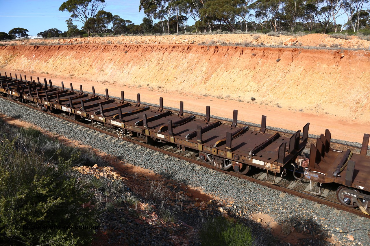 160531 9859
Binduli, 3PM4 steel train, RKXF 60094 a jumbo plate waggon, RKXF 60094 was originally built by the NSWGR at Chullora Workshops as part of a batch of ten BC type waggons of 73 feet and 6 inches long and was originally numbered BC 21018. Other codes carried were NQDX, NKDX then RKXX before 70 tonne bogies were fitted in 1995 for the current code. 31st May 2016 at West Kalgoorlie.
Keywords: RKXF-type;RKXF60094;NSWGR-Chullora-WS;BC-type;BC21018;BCX-type;NQDX-type;NKDX-type;RKXX-type;