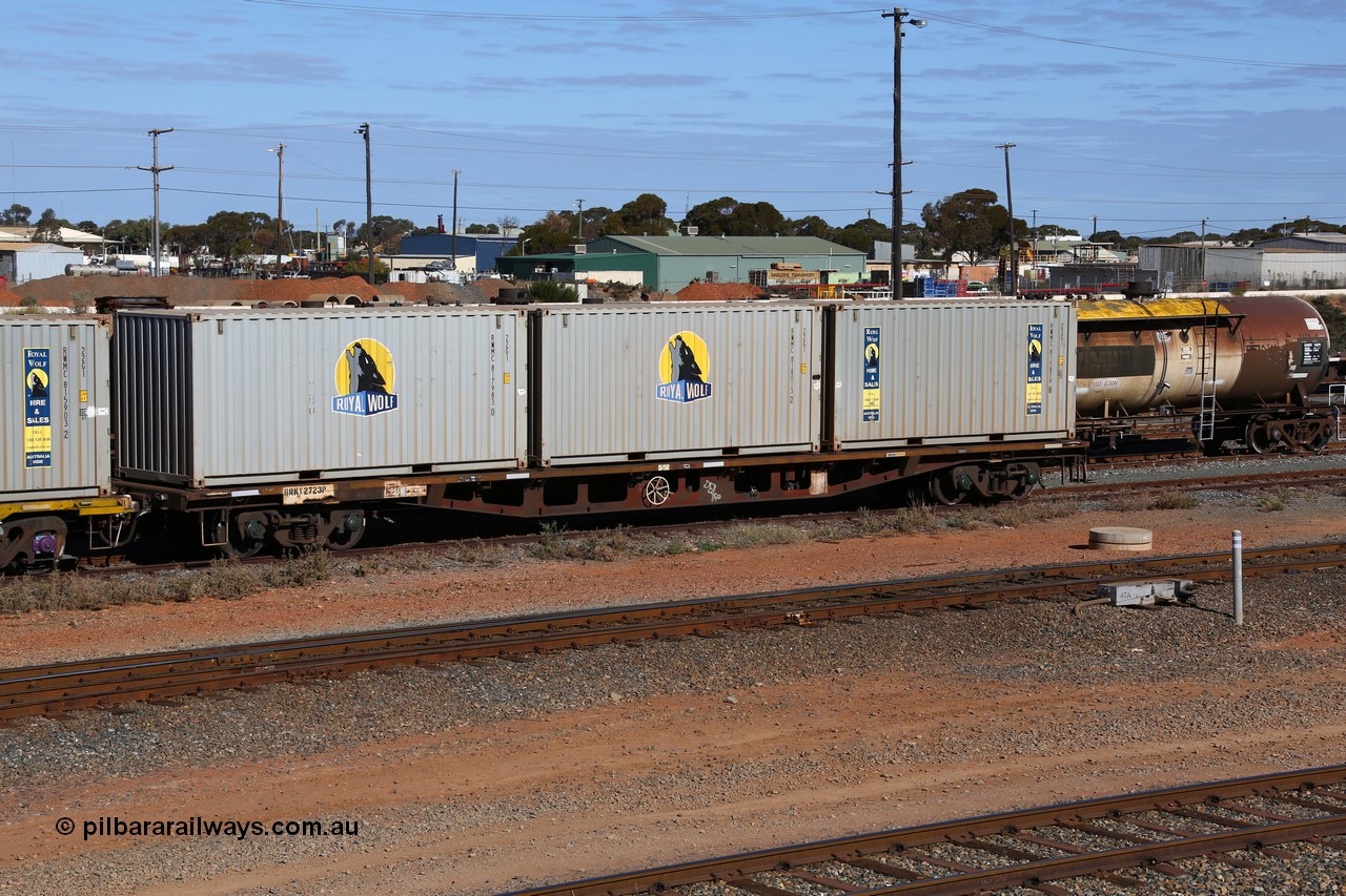 160531 9879
West Kalgoorlie, RRKY type container waggon RRKY 2723, originally built by Perry Engineering SA as part of a batch of forty five RM type container waggons in 1974, before going through several code changes and then fitted with aligned bogies as AQPY. Loaded with three 22G1 type 20' Royal Wolf boxes, RWMC 817983, RWMC 818013 and RWMC 815879. 31st of May 2016.
Keywords: RRKY-type;RRKY2723;Perry-Engineering-SA;RM-type;AQPY-type;AQMP-type;RQKY-type;